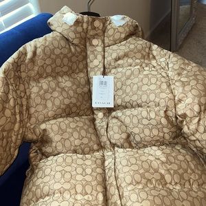 Authentic Brand New Coach monogrammed coat.